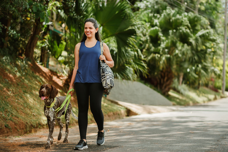 woman walking dog